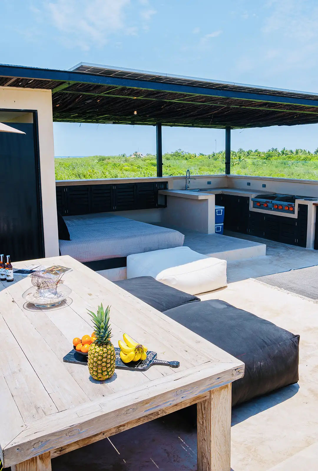 Rooftop kitchen and plunge pool at the Tulum house.